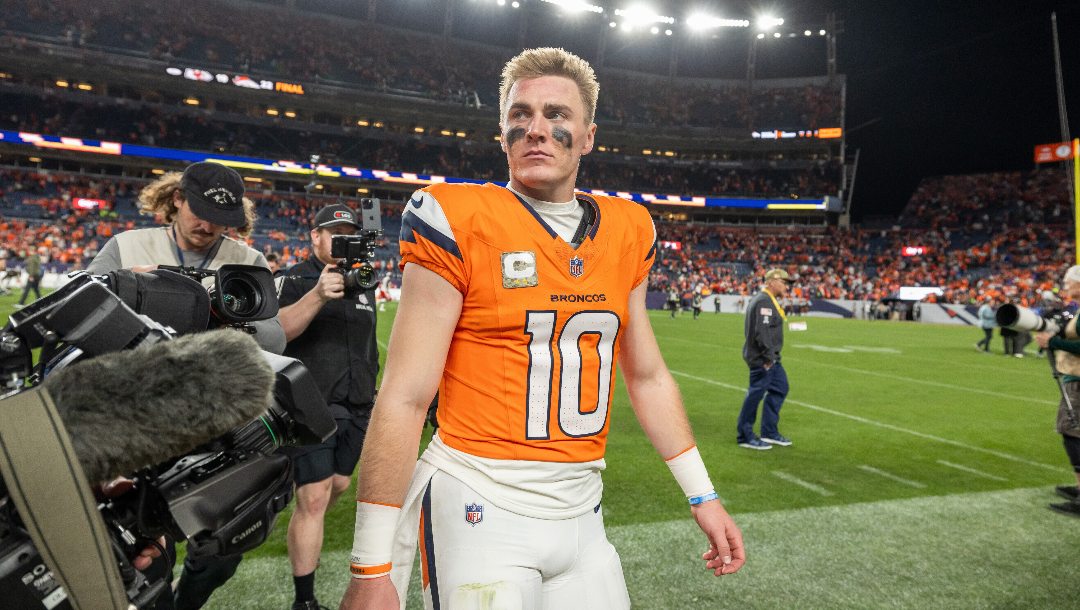 Denver Broncos quarterback Bo Nix (10) walks off the field after the Broncos defeat the Kansas City Chiefs 22-19 in an NFL football game, Sunday, Nov. 16, 2025, in Denver.
