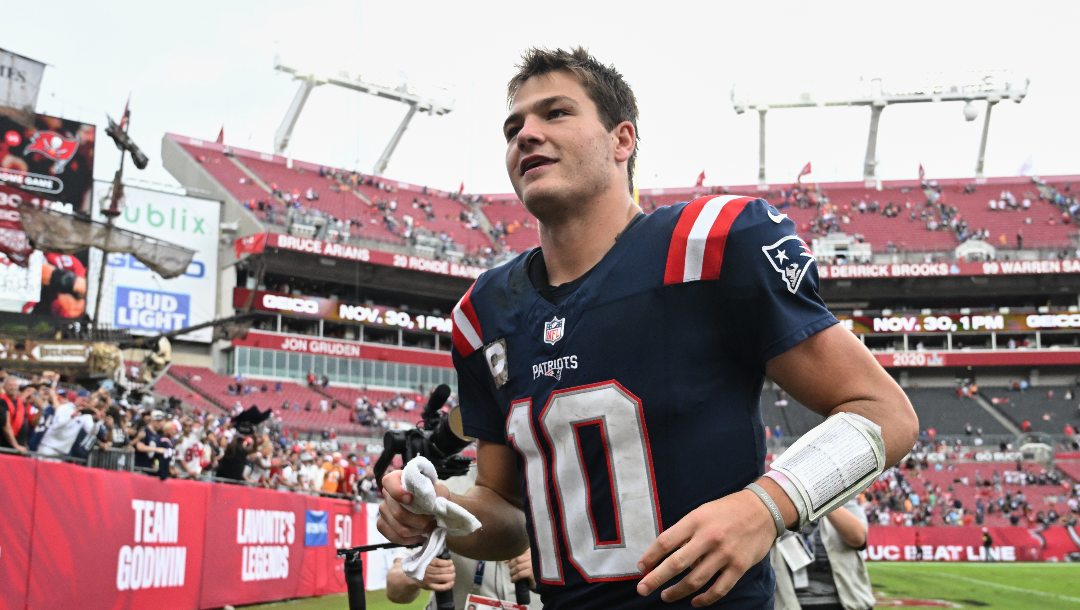 New England Patriots quarterback Drake Maye (10) runs off the field after an NFL football game against the Tampa Bay Buccaneers, Sunday, Nov. 9, 2025, in Tampa, Fla.