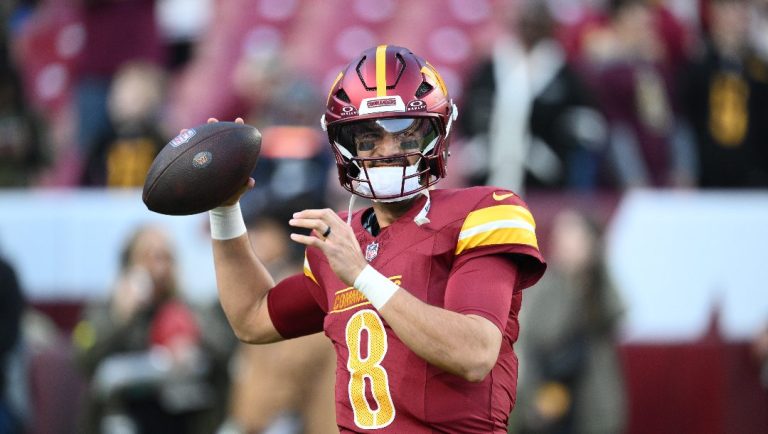 Washington Commanders quarterback Marcus Mariota warms up before an NFL football game against the Detroit Lions Sunday, Nov. 9, 2025, in Landover, Md.