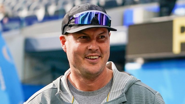 Former Los Angeles Chargers quarterback Philip Rivers watches warmups before an NFL football game between the Chargers and the Denver Broncos, Dec. 10, 2023, in Inglewood, Calif.