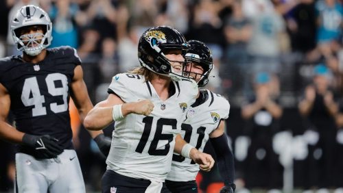 Jacksonville Jaguars quarterback Trevor Lawrence (16) reacts after scoring a touchdown during overtime of an NFL football game against the Las Vegas Raiders, Sunday, Nov. 2, 2025, in Las Vegas.