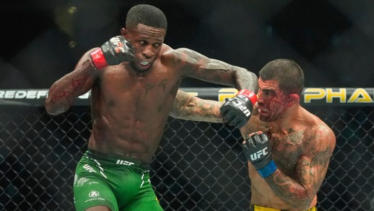 Jamaica's Randy Brown, left, punches Brazil's Elizeu Zaleski dos Santos during the third round of a welterweight bout.