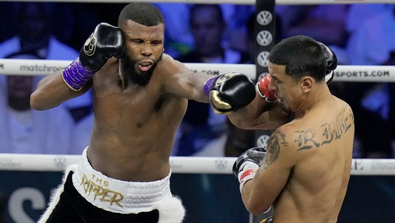 Sweden's Badou Jack, left, lands a blow on Richard Rivera of the United States during their cruiserweight boxing fight.