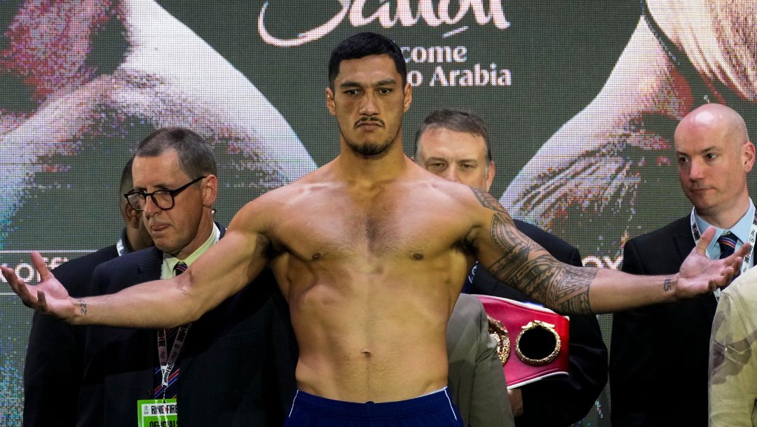 Australian boxer Jai Opetaia stands on the scale during a weigh-in, Friday, May 17, 2024, in Riyadh, Saudi Arabia.
