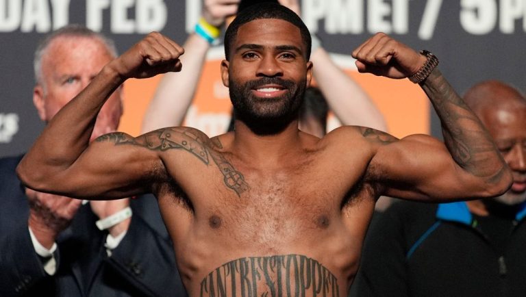 Stephen Fulton Jr. poses during a ceremonial weigh-in for featherweight title fight against Brandon Figueroa.