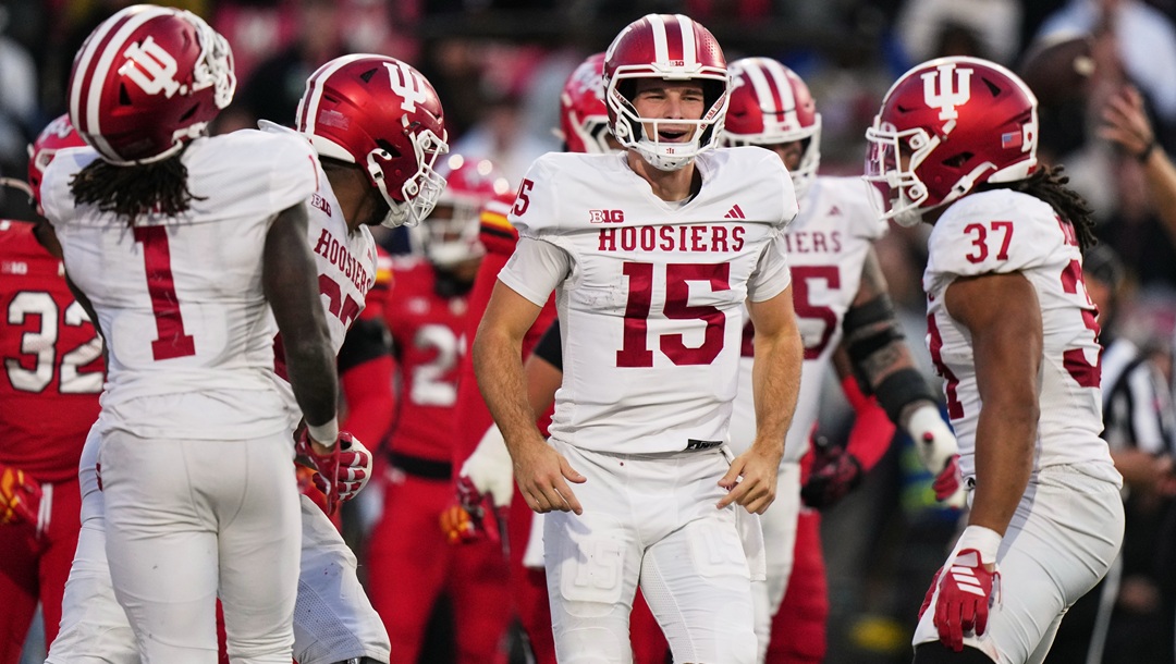 Indiana quarterback Fernando Mendoza (15) reacts after running back Roman Hemby scored a touchdown during the second half of an NCAA college football game, Saturday, Nov. 1, 2025, in College Park, Md. (