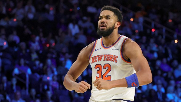 Karl-Anthony Towns #32 of the New York Knicks flexes after scoring against the Orlando Magic in the second quarter of a semifinal game of the Emirates NBA Cup at T-Mobile Arena on December 13, 2025 in Las Vegas, Nevada. The Knicks defeated the Magic 132-120.