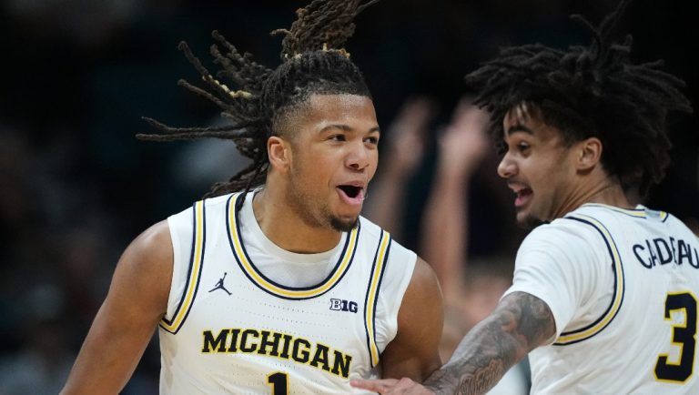 Michigan guard Trey McKenney (1) and guard Elliot Cadeau (3) celebrate a score against Gonzaga during the second half of an NCAA college basketball game in the Players Era tournament in Las Vegas, Wednesday, Nov. 26, 2025.
