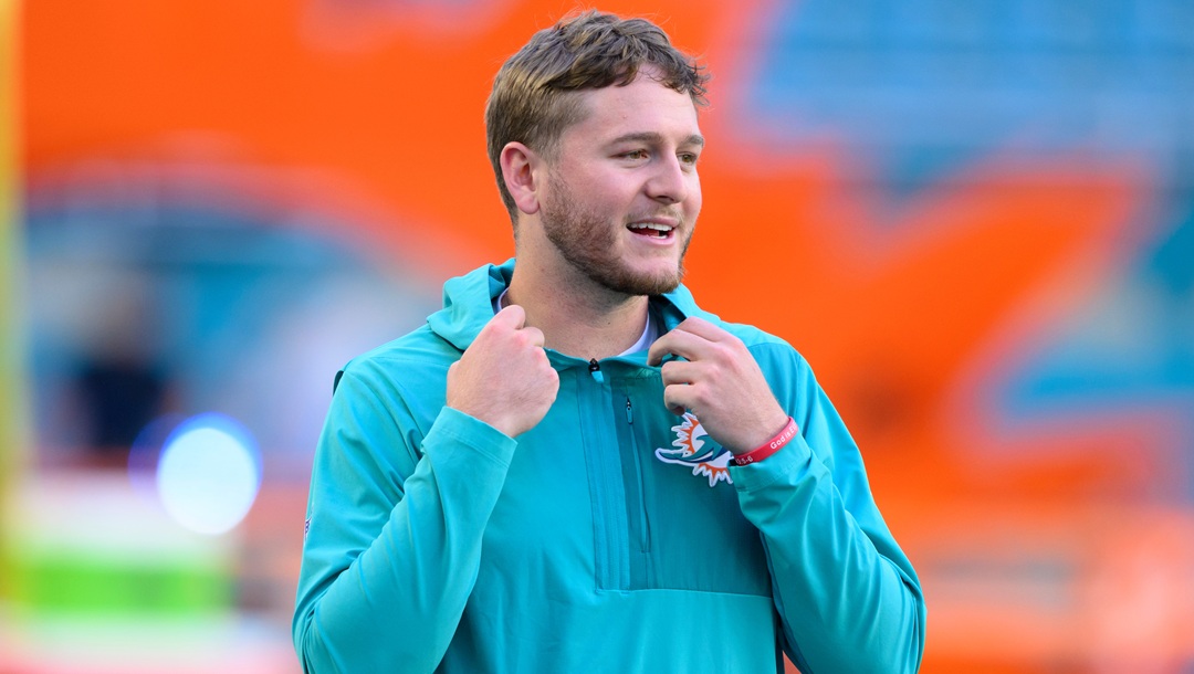 Miami Dolphins quarterback Quinn Ewers smiles on the sidelines before an NFL football game against the Baltimore Ravens, Thursday, Oct. 30, 2025, in Miami Gardens, Fla.