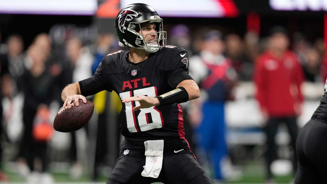 Atlanta Falcons quarterback Kirk Cousins throws against the Seattle Seahawks during the first half of an NFL football game, Sunday, Dec. 7, 2025, in Atlanta.