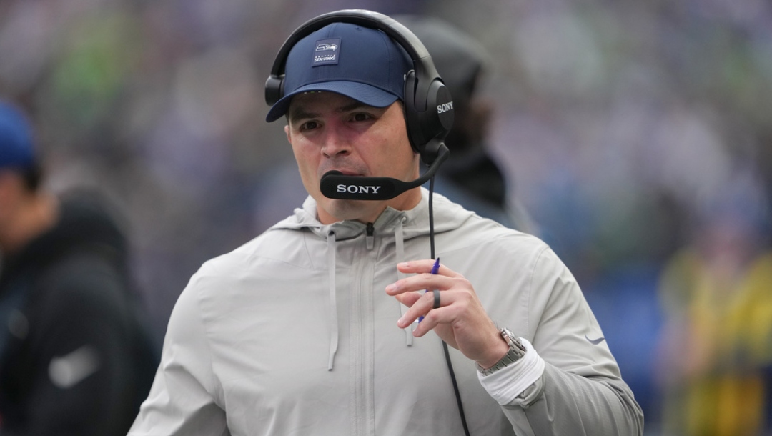 Seattle Seahawks head coach Mike Macdonald walks on the sideline during the first half of an NFL football game against the Indianapolis Colts, Sunday, Dec. 14, 2025, in Seattle.