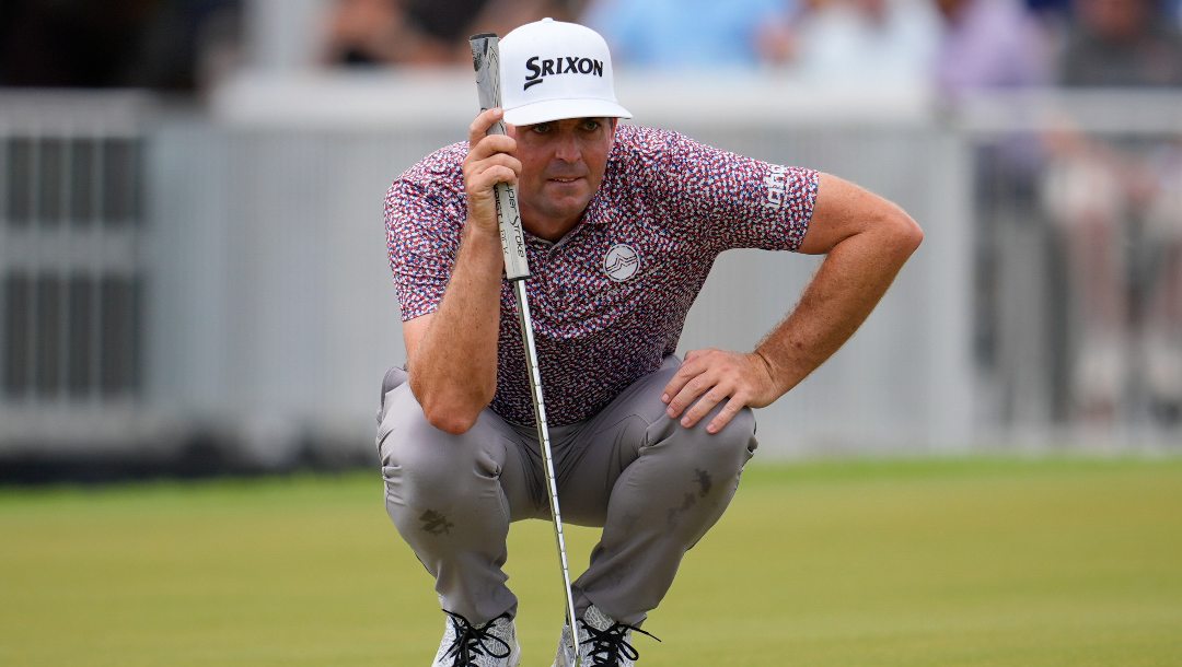 Keegan Bradley lines up a putt on the third green during the final round of the Tour Championship golf tournament, Sunday, Aug. 24, 2025, in Atlanta.