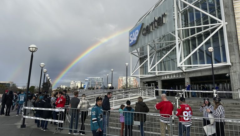 A rainbow is shown as fans line up outside SAP Center at San Jose before an NHL hockey game between the Chicago Blackhawks and the San Jose Sharks in San Jose, Calif., Saturday, March 23, 2024.