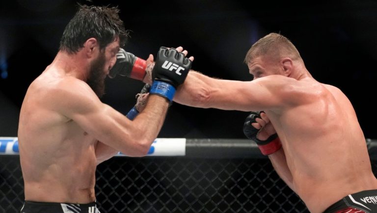 Jan Blachowicz lands a left to Magomed Ankalaev during a UFC 282 mixed martial arts light heavyweight title bout.