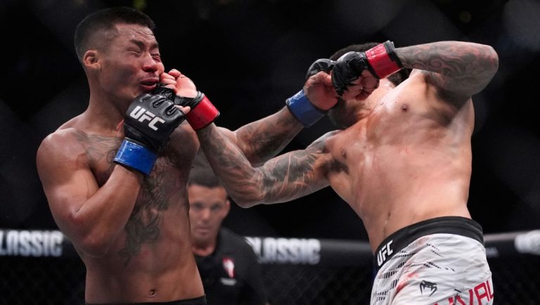 Brandon Royval hits Joshua Van in a flyweight fight at UFC 317, Saturday, June 28, 2025, in Las Vegas.